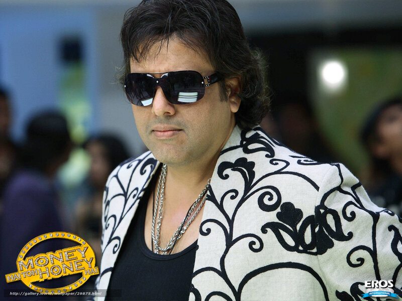 Actor in sunglasses and patterned jacket