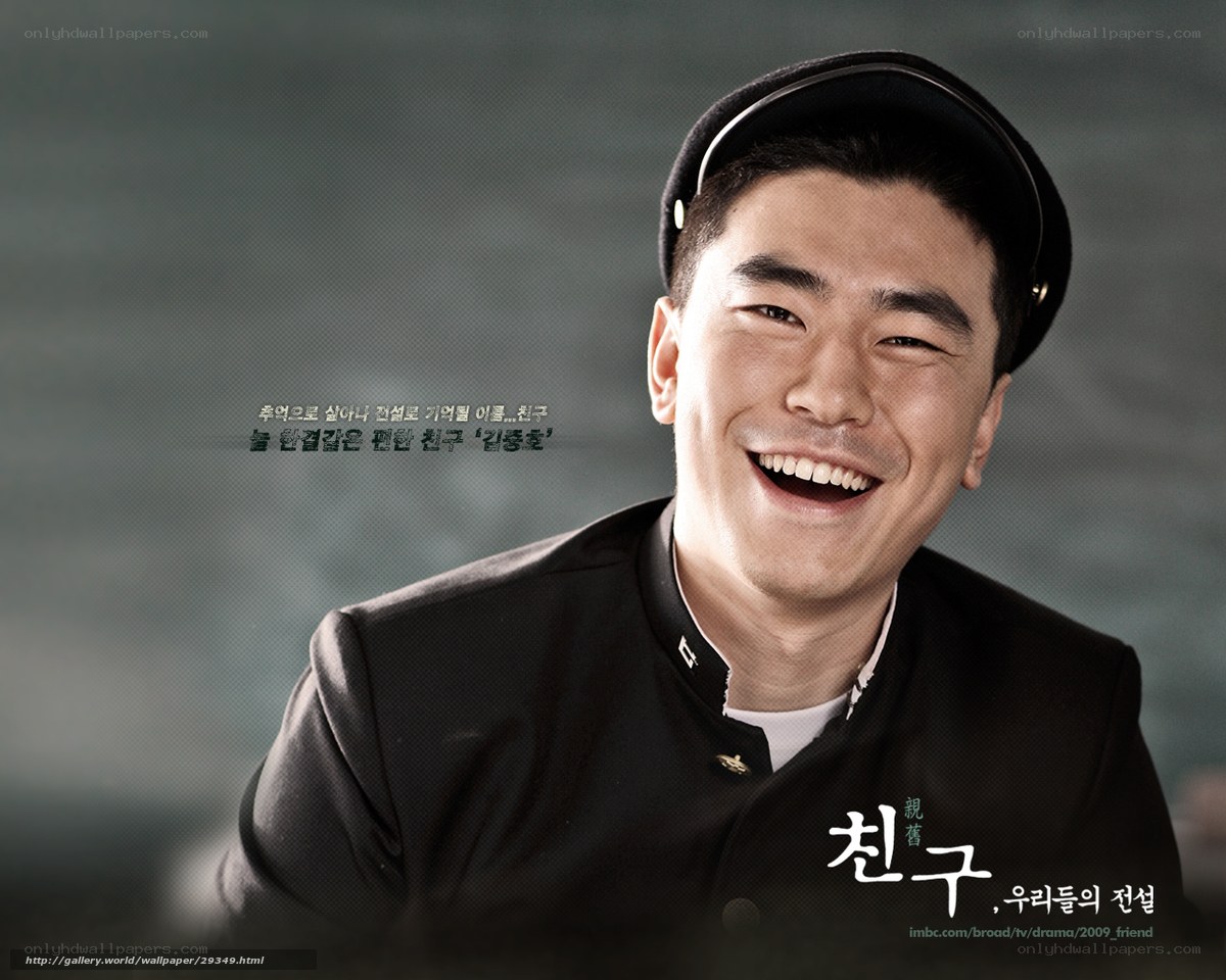 actor in uniform smiling