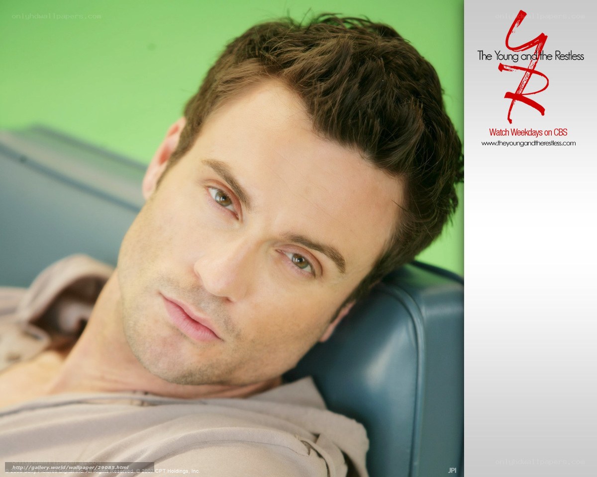 actor on couch promotional image