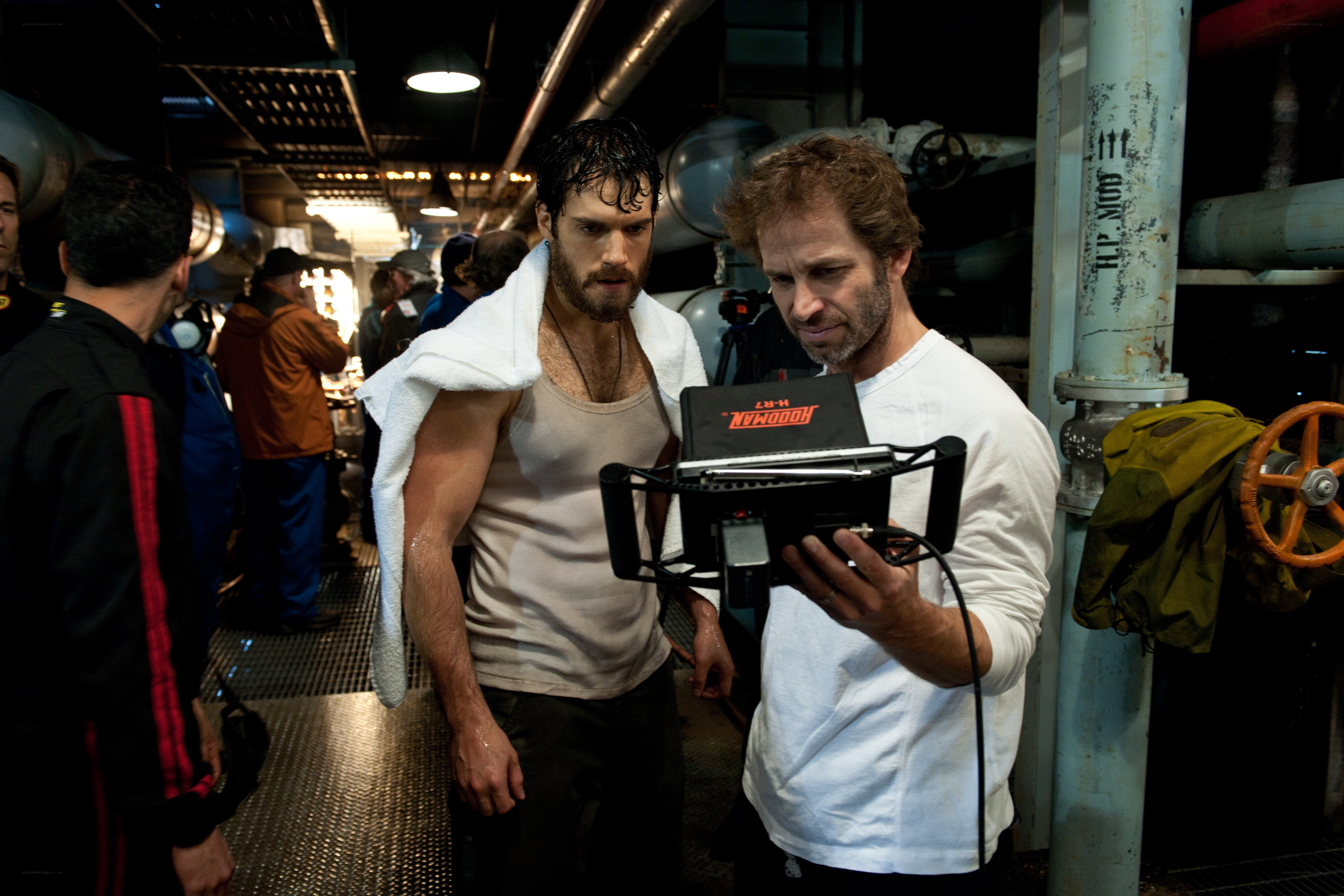 Actor on film set with crew