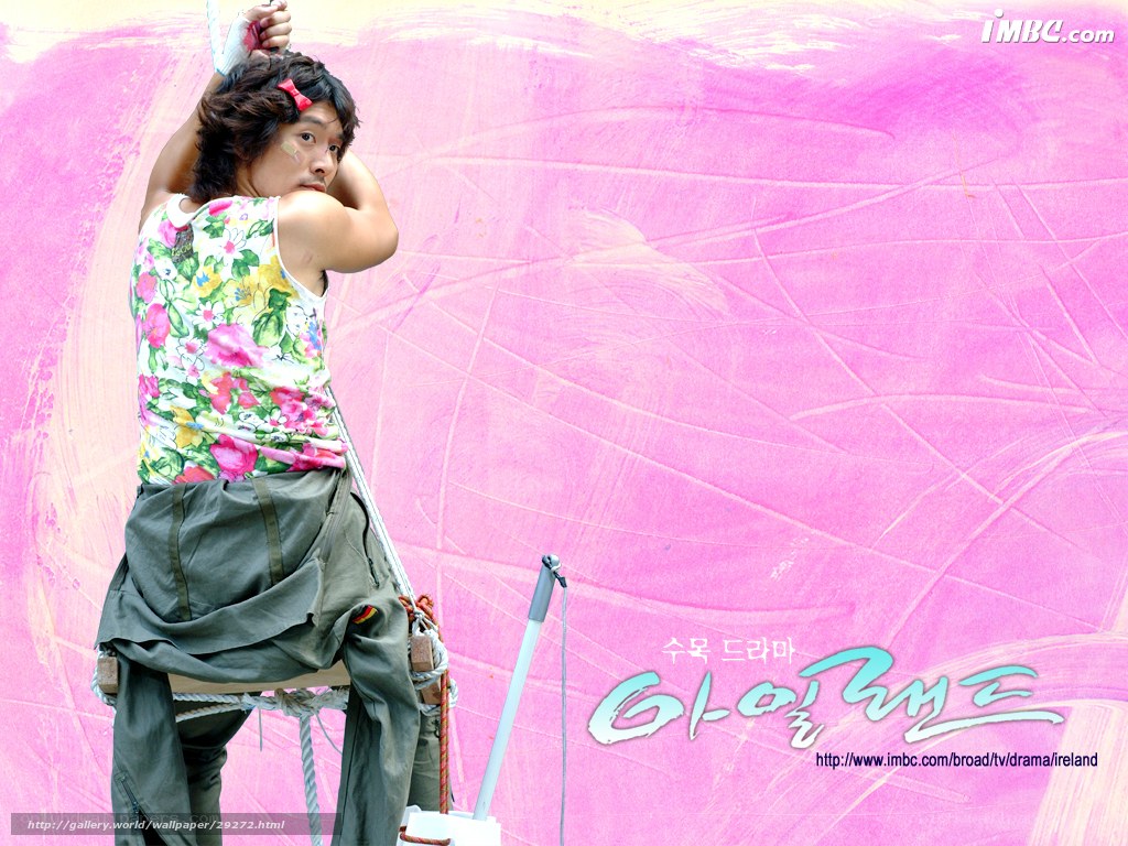 actor on set with pink backdrop