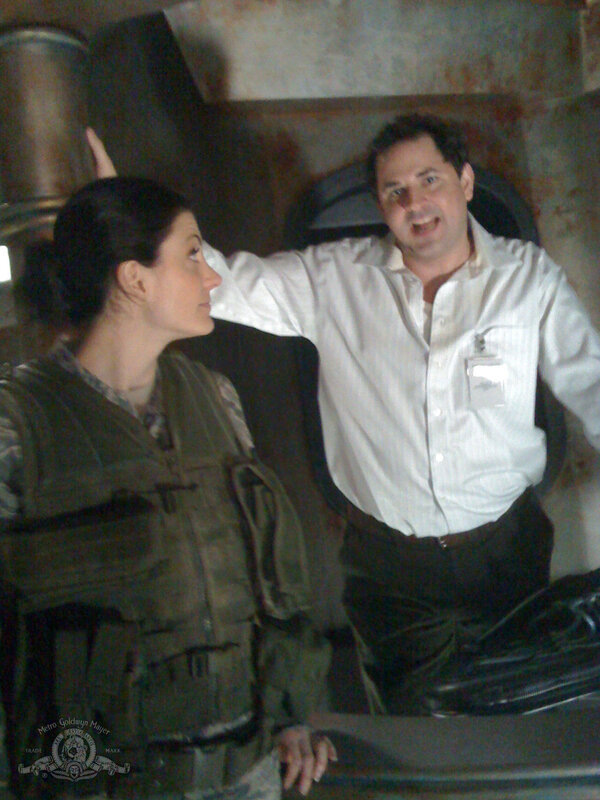 actor on set with woman