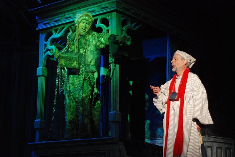 Actor on Stage with Statue