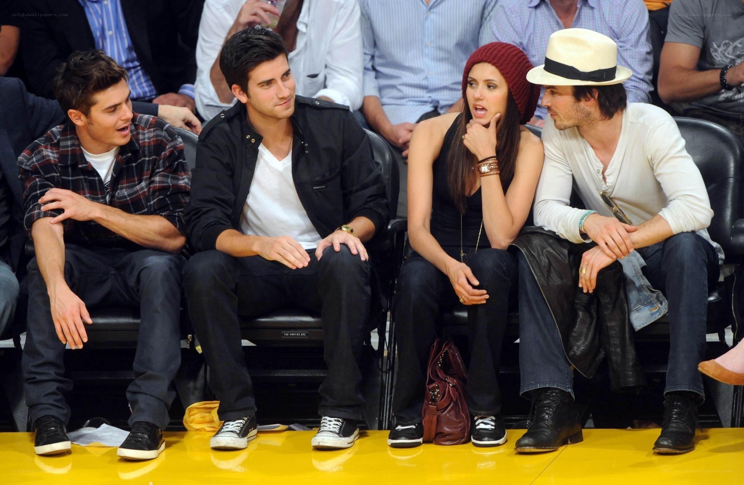 Actors at a basketball game