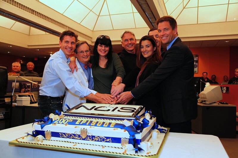 Actors Cutting Cake