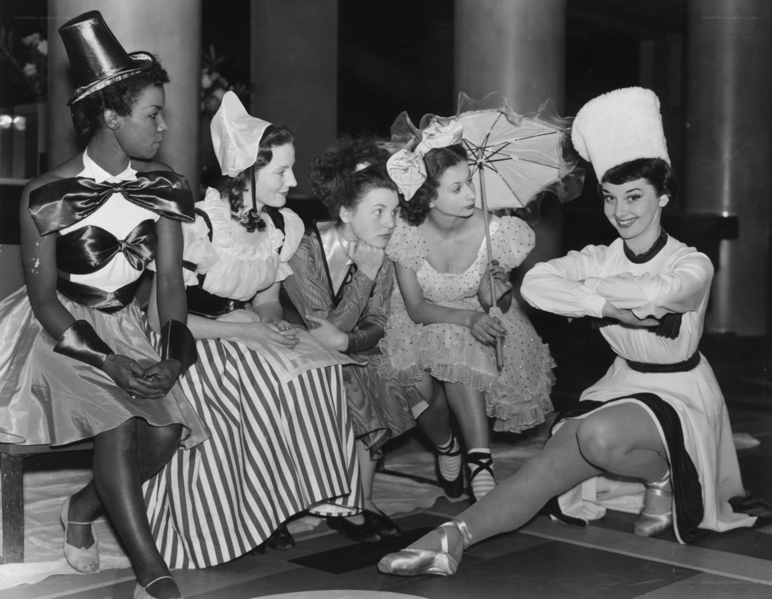 Actors in costume on stage