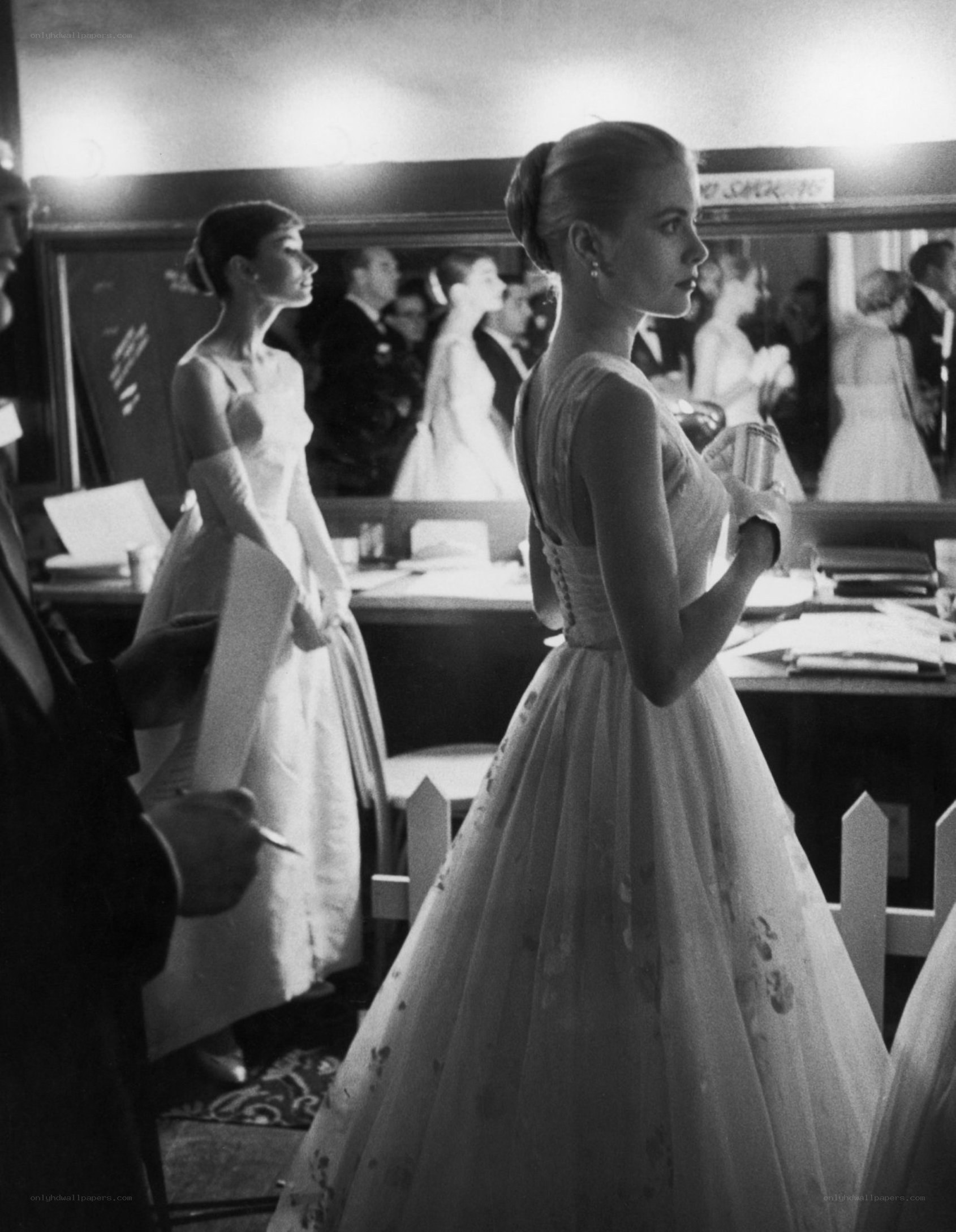 Actors in wedding gowns
