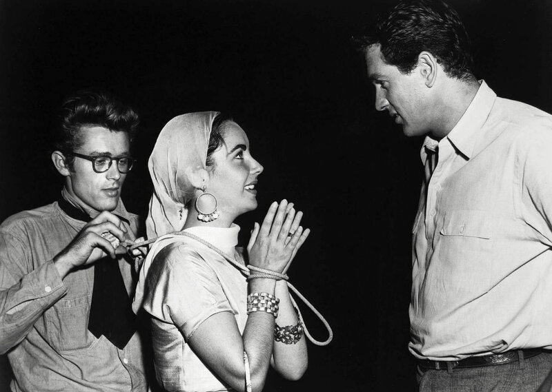Actors on film set with rope