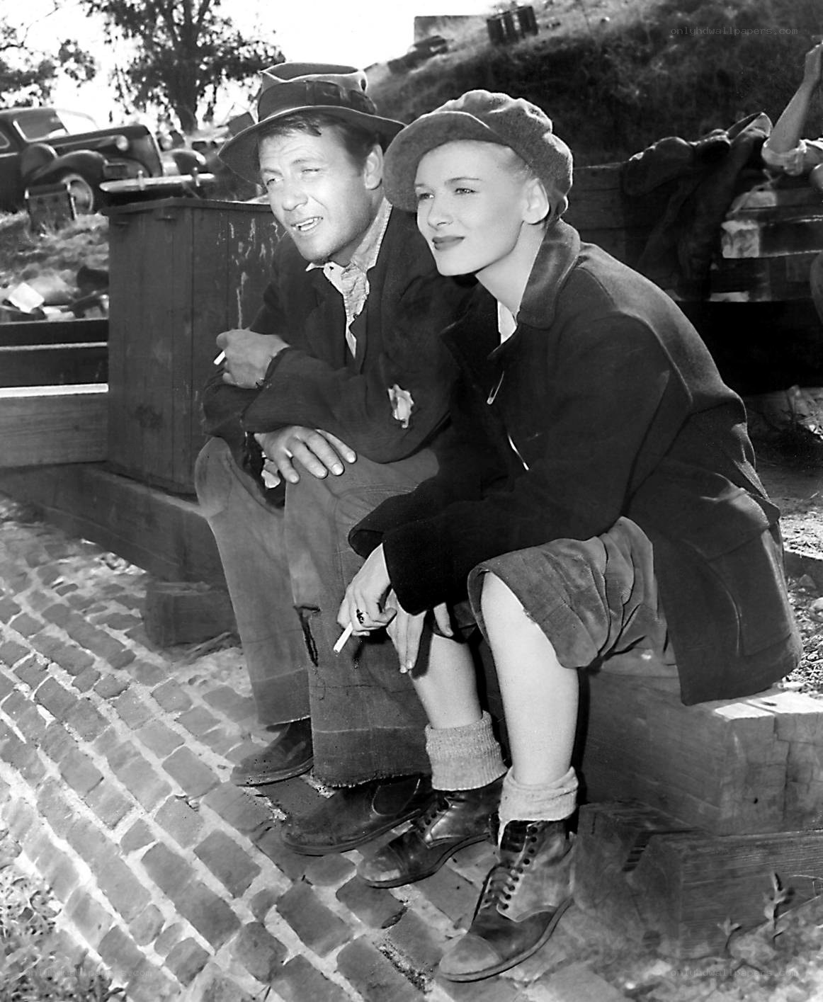 Actors on set in vintage attire