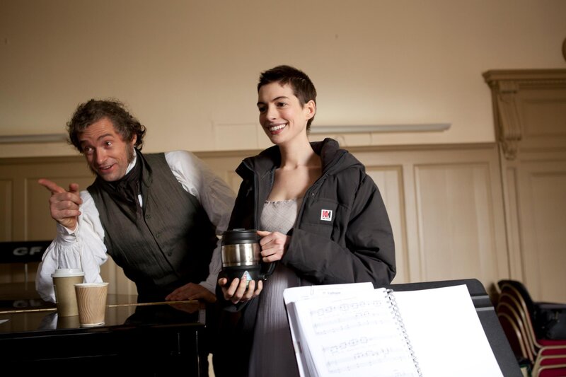 Actors on set with coffee