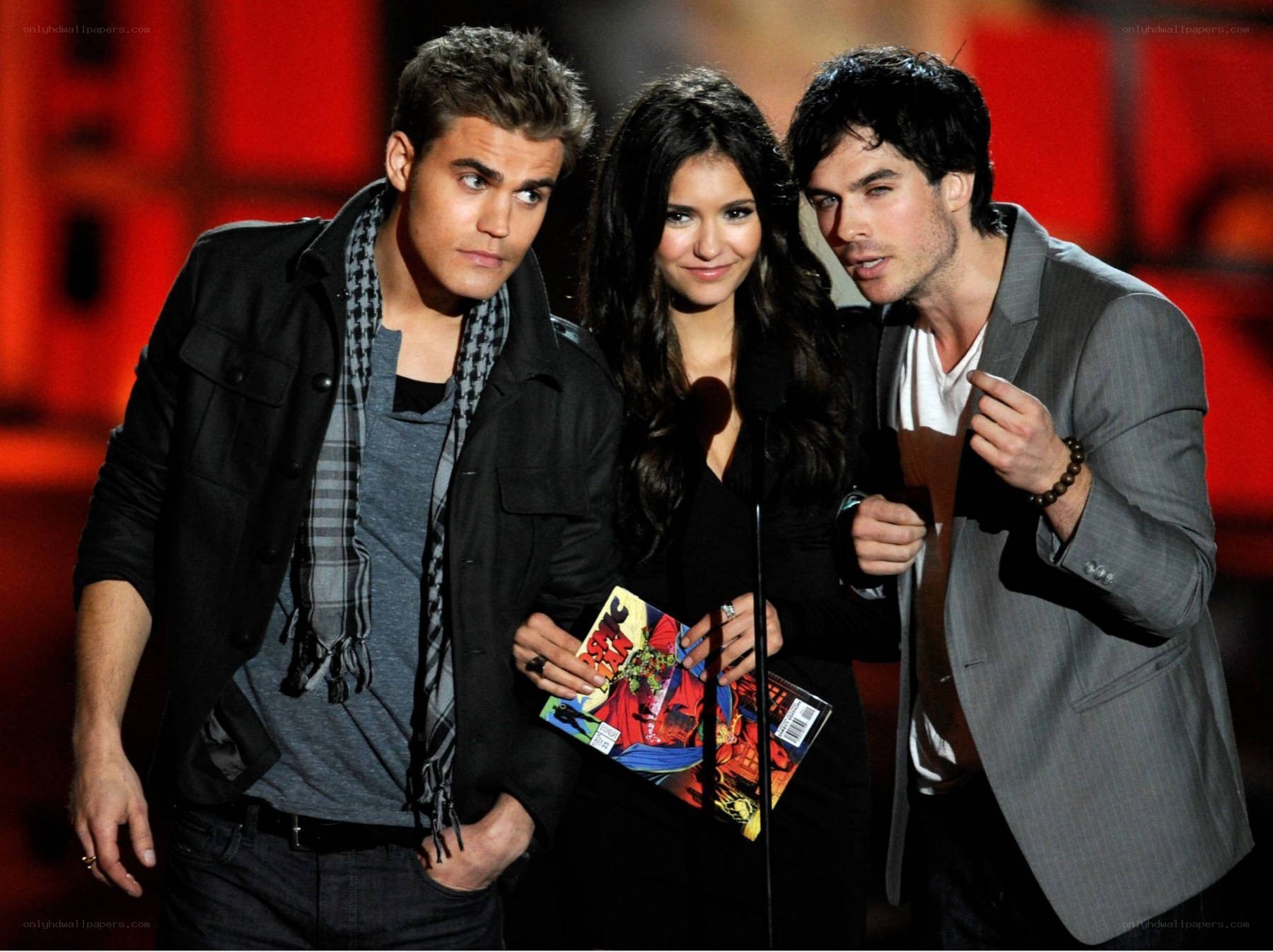 actors on stage at awards