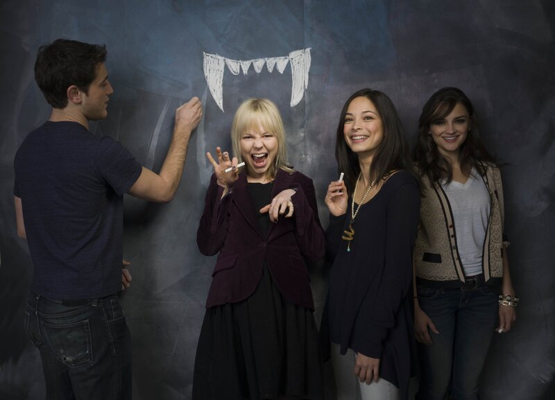 Actors posing with chalk drawing