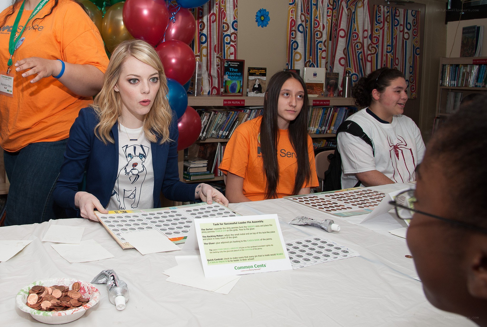 Actress at school event with students