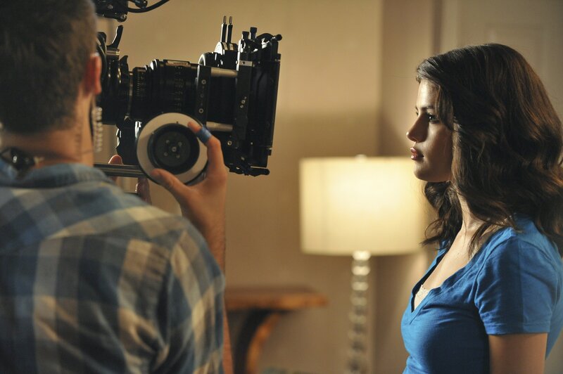 Actress being filmed on set