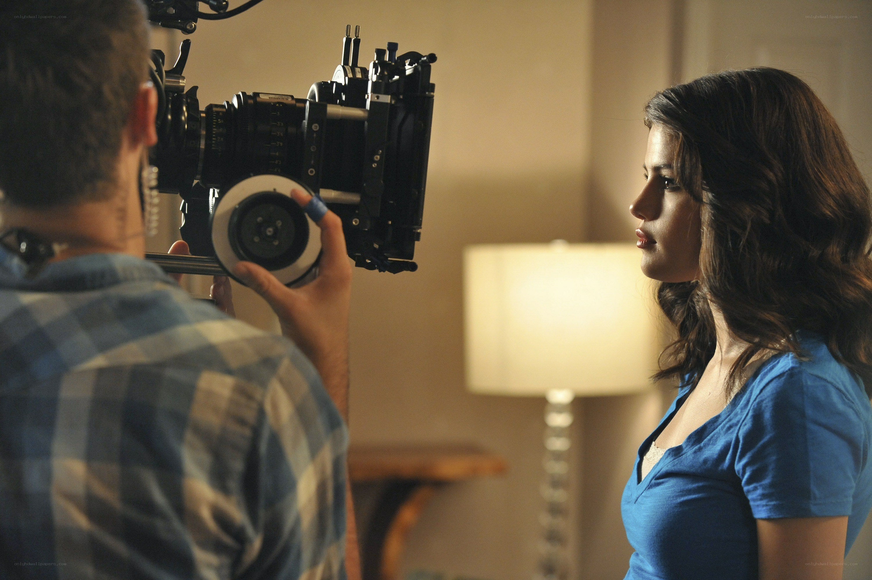 Actress being filmed on set