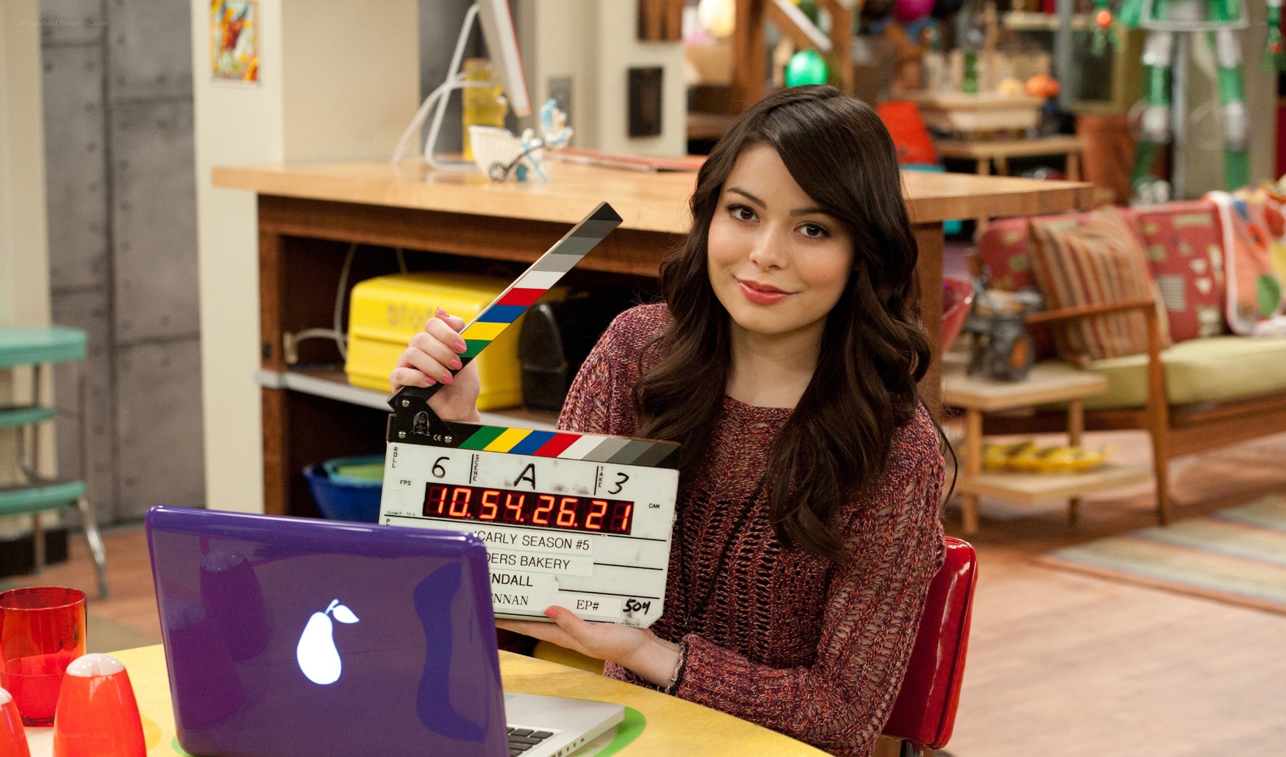 Actress holding clapperboard