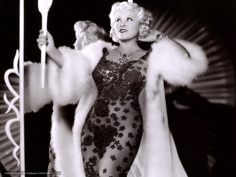 Actress in fur coat and sequined dress