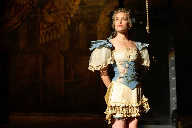 Actress in period costume on stage