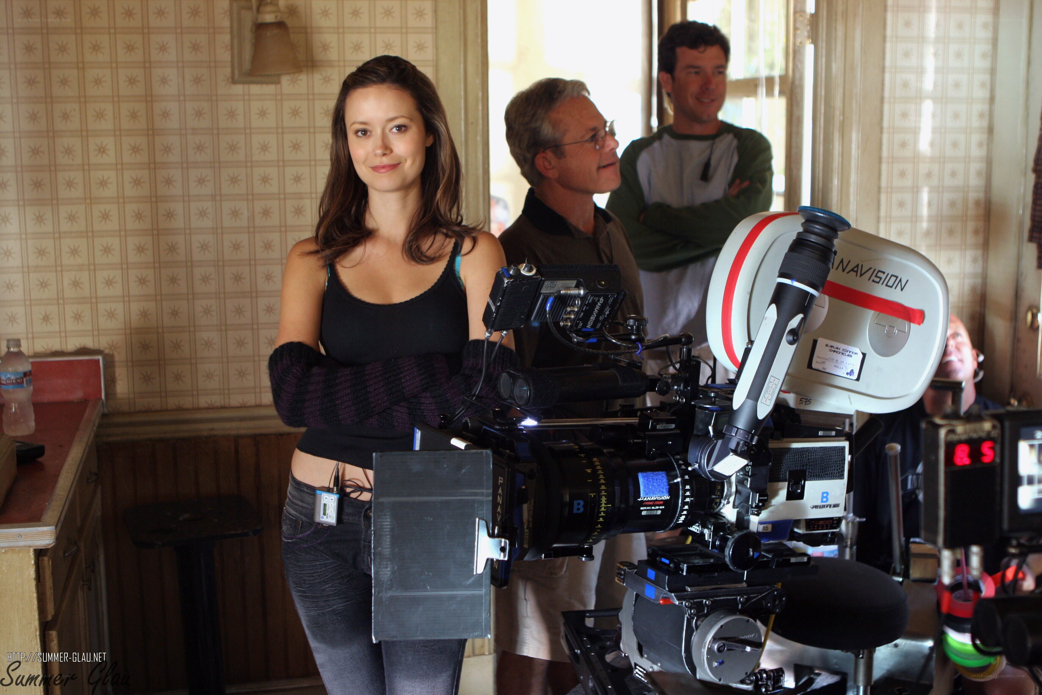 Actress on film set with camera