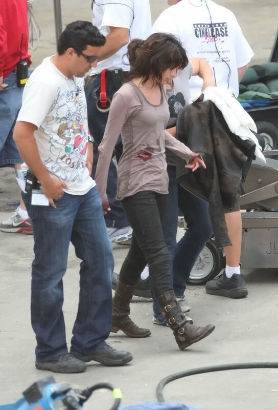 Actress on film set with crew