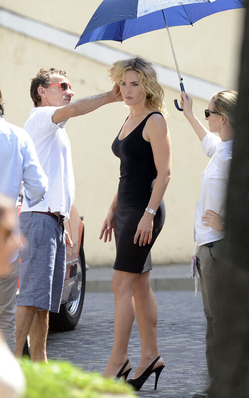 Actress on film set with crew