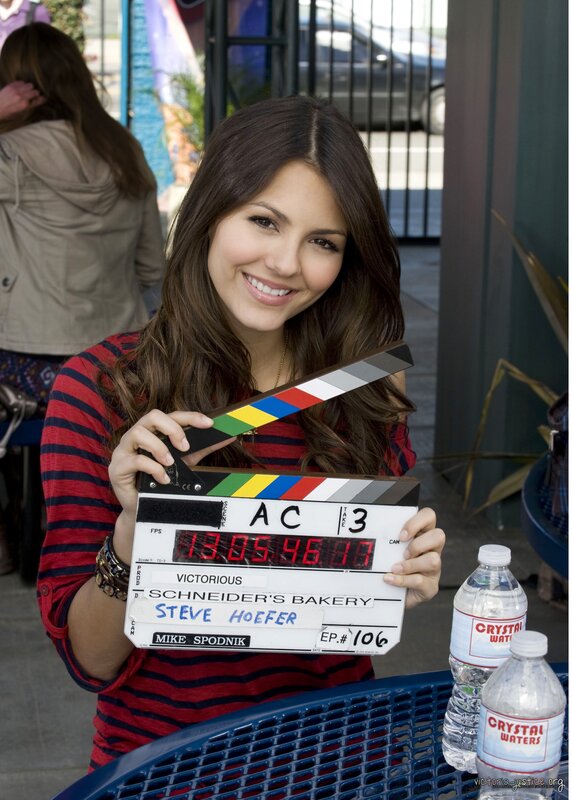 actress on set with clapperboard
