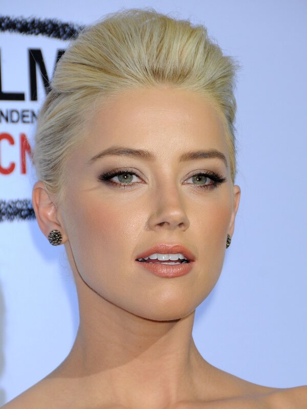 Actress with blonde hair at event