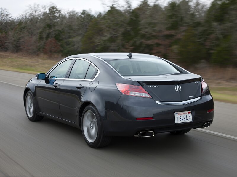 Acura TL driving on a road