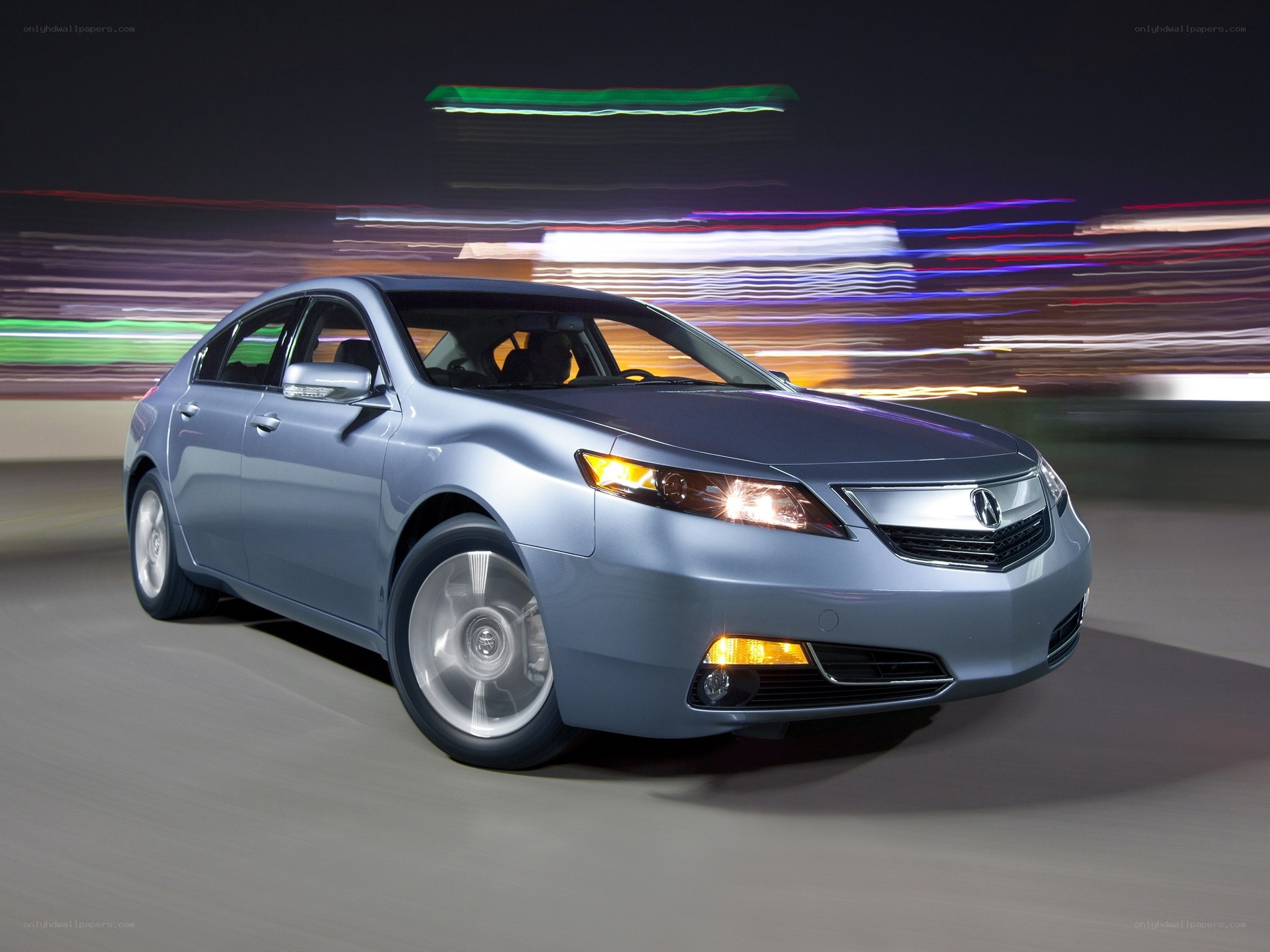 Acura TL in motion at night