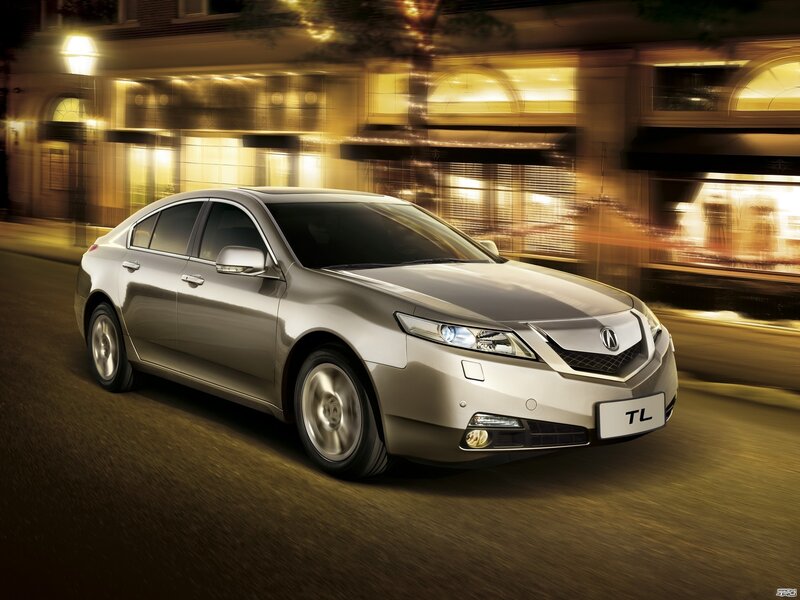 Acura TL in motion at night