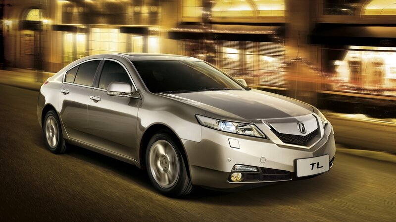 Acura TL in motion at night