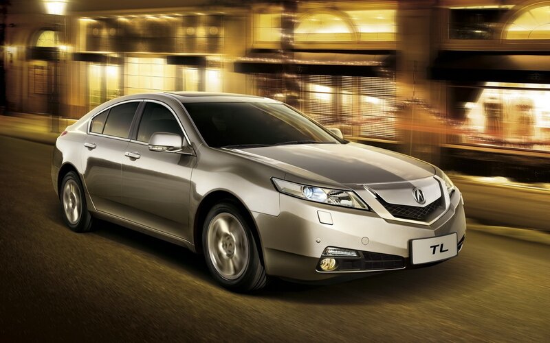 Acura TL in motion at night