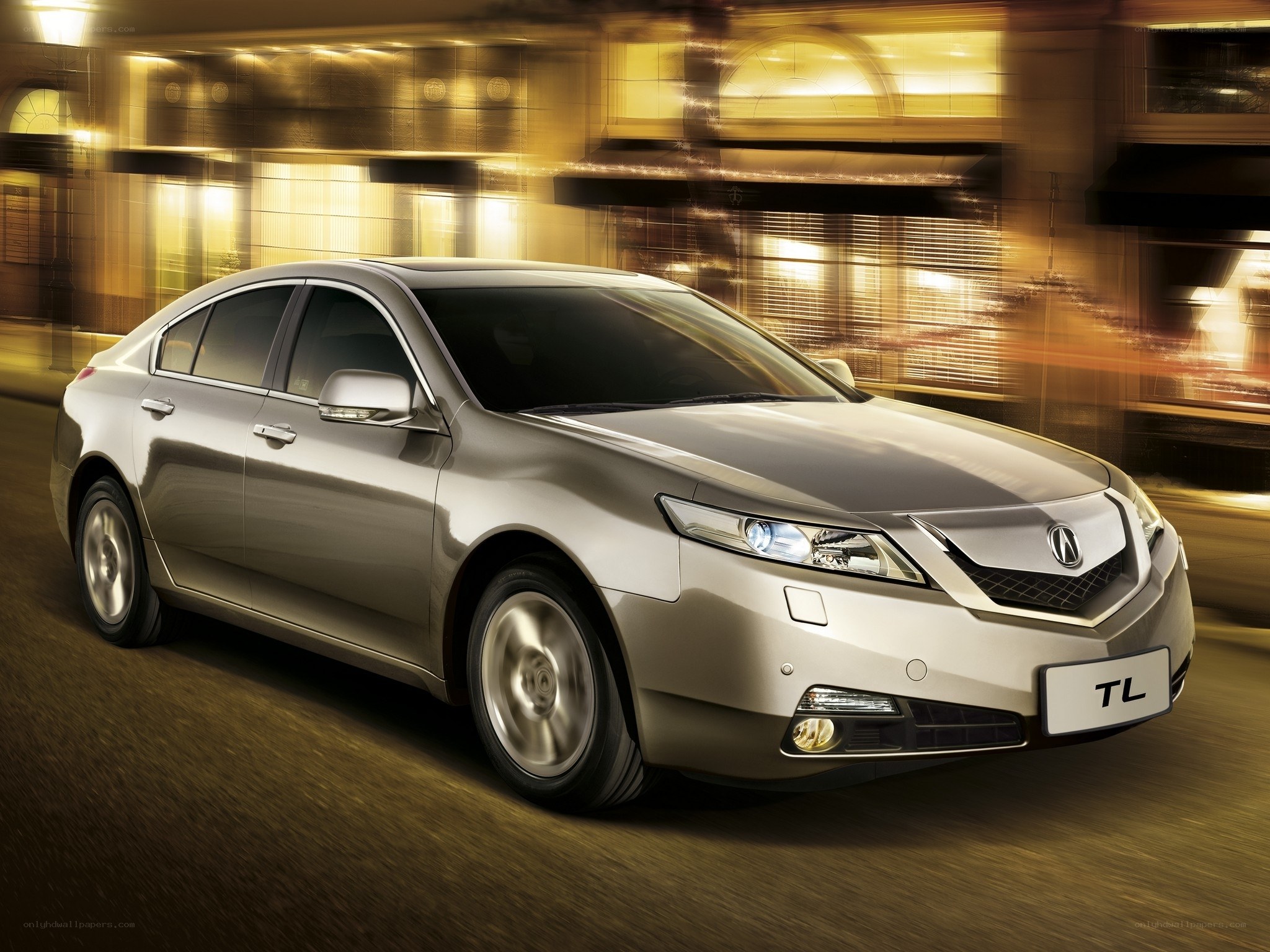 Acura TL in motion at night