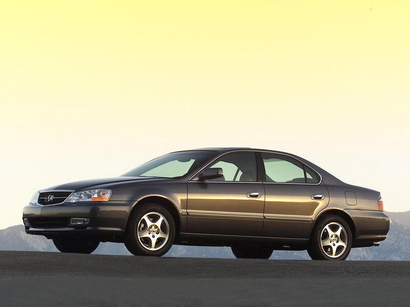 Acura TL sedan on a road