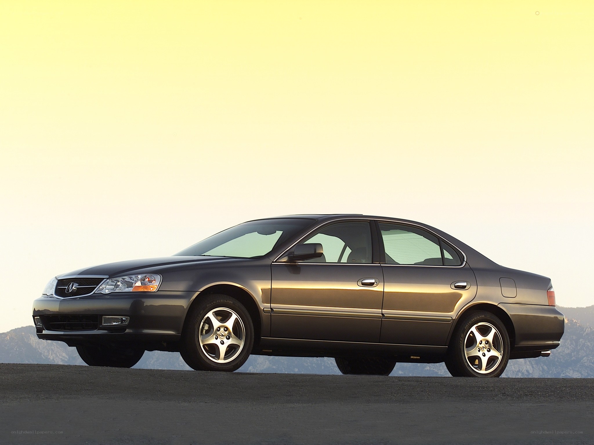 Acura TL sedan on a road