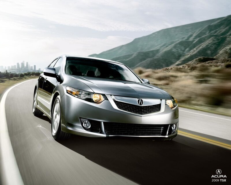 Acura TSX driving on a road