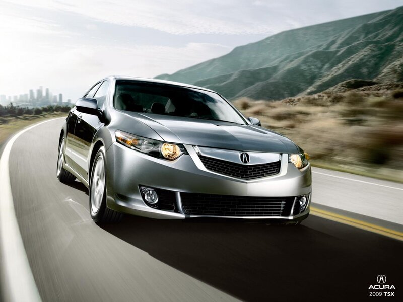 Acura TSX driving on a road
