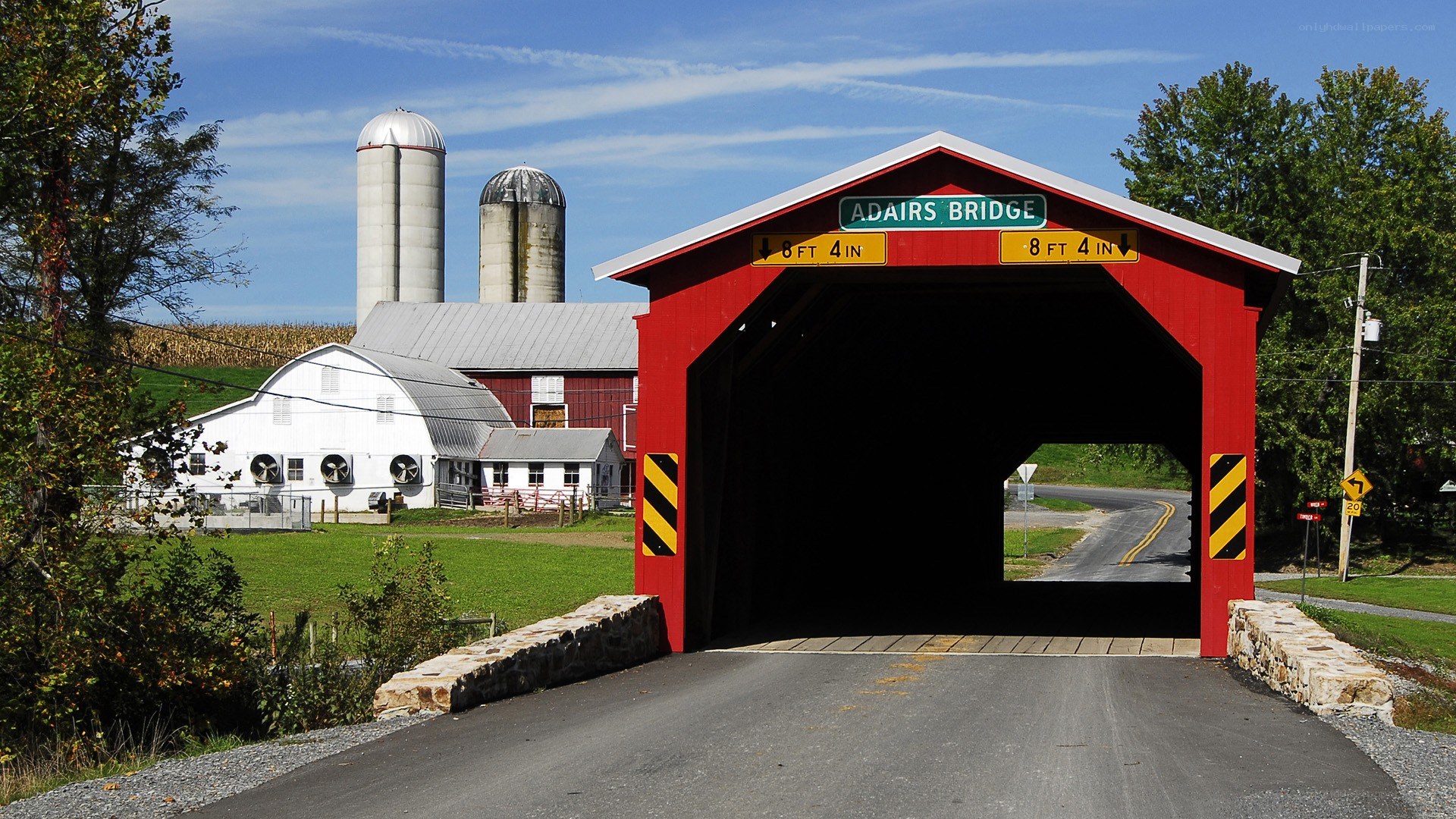 Adairs Bridge with farm in background