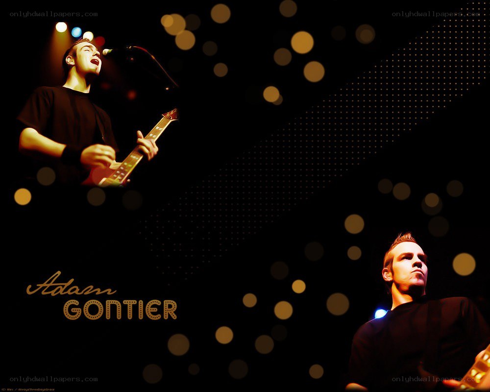 Adam Gontier performing on stage