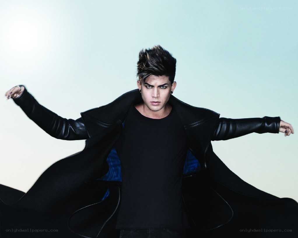 Adam Lambert in black coat