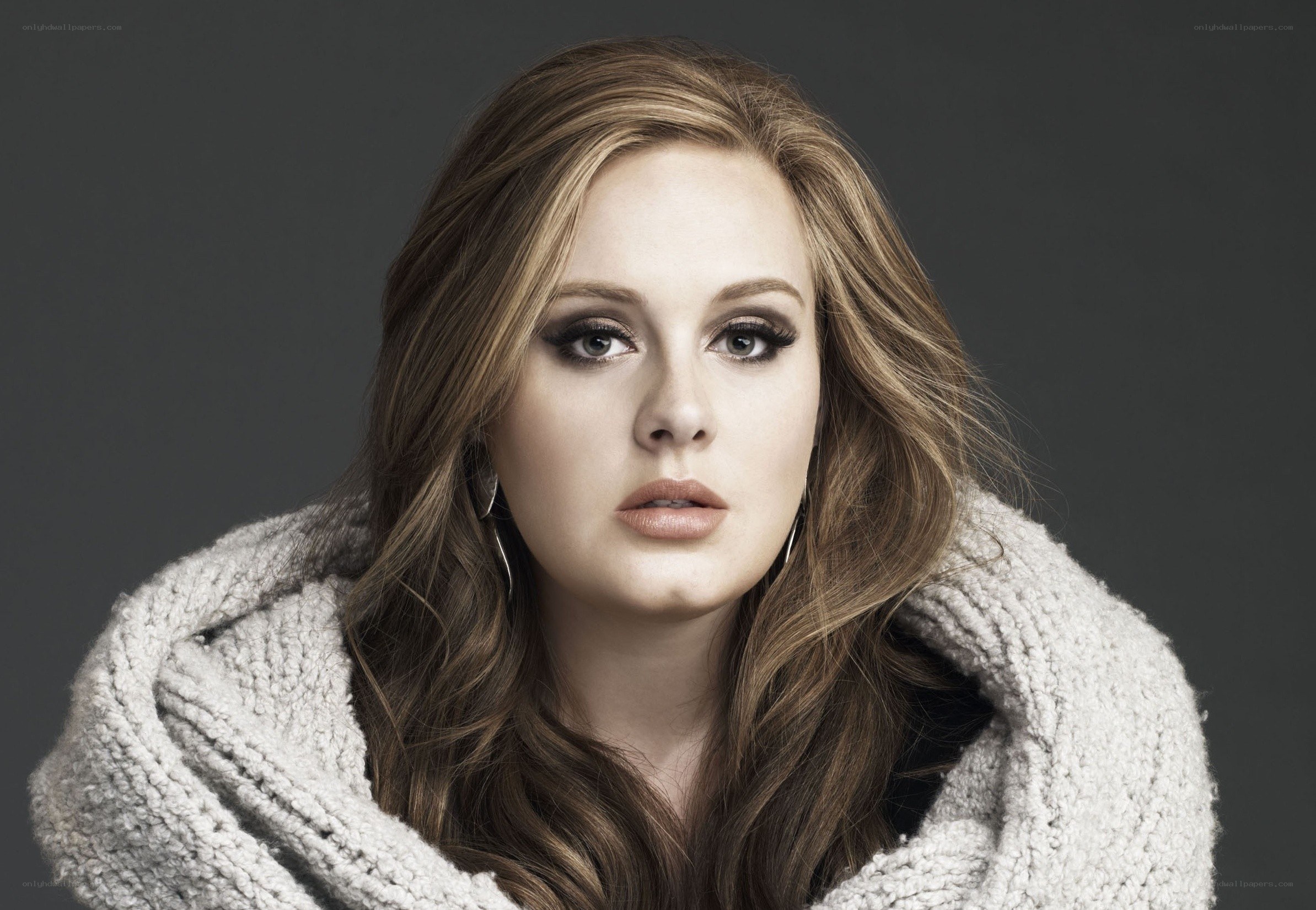 Adele in a cozy sweater