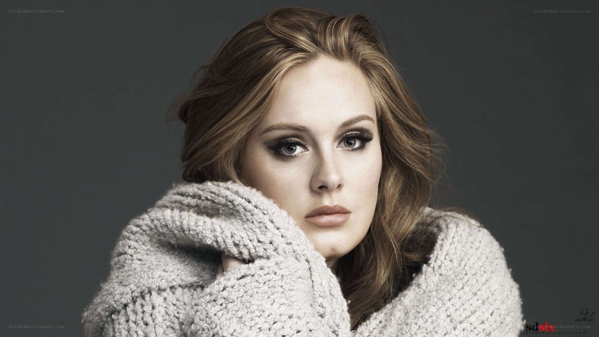 Adele in a cozy sweater