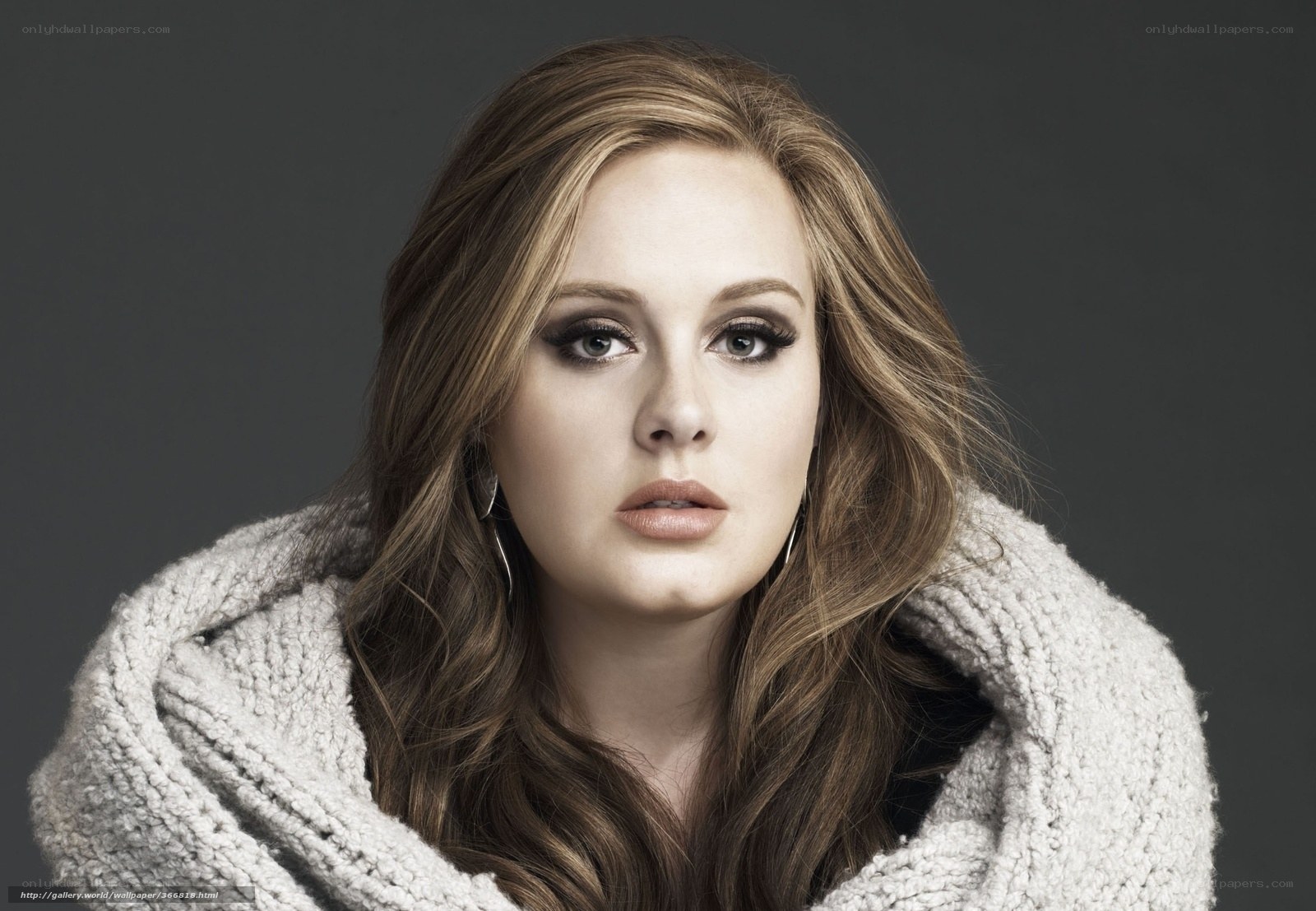 Adele in a cozy sweater