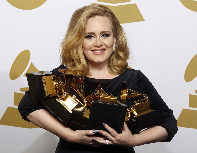 Adele with Grammy awards