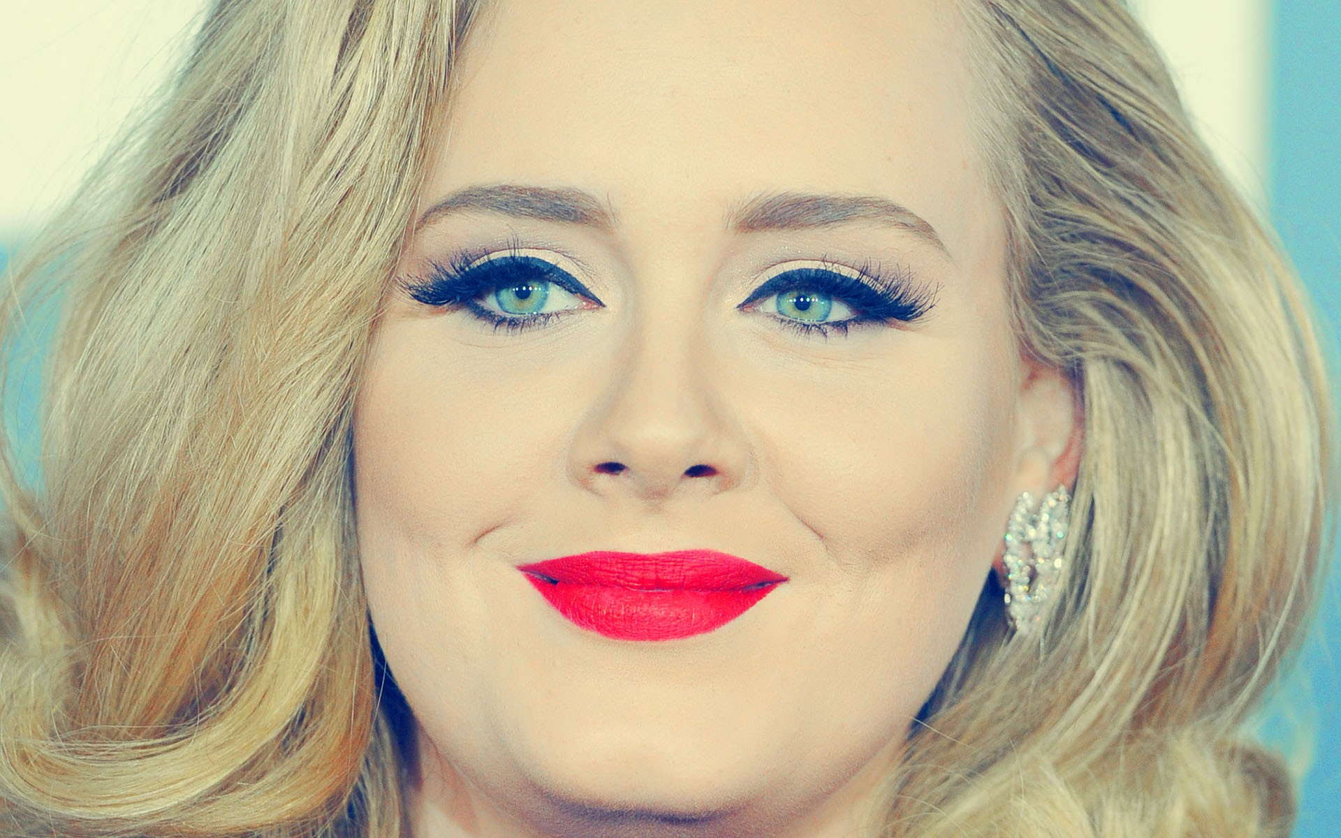 Adele with red lipstick