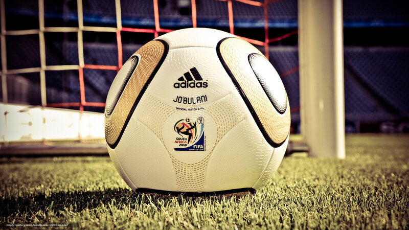 Adidas football on grass