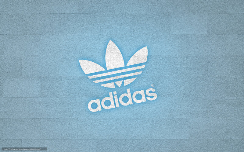 Adidas logo on blue wall