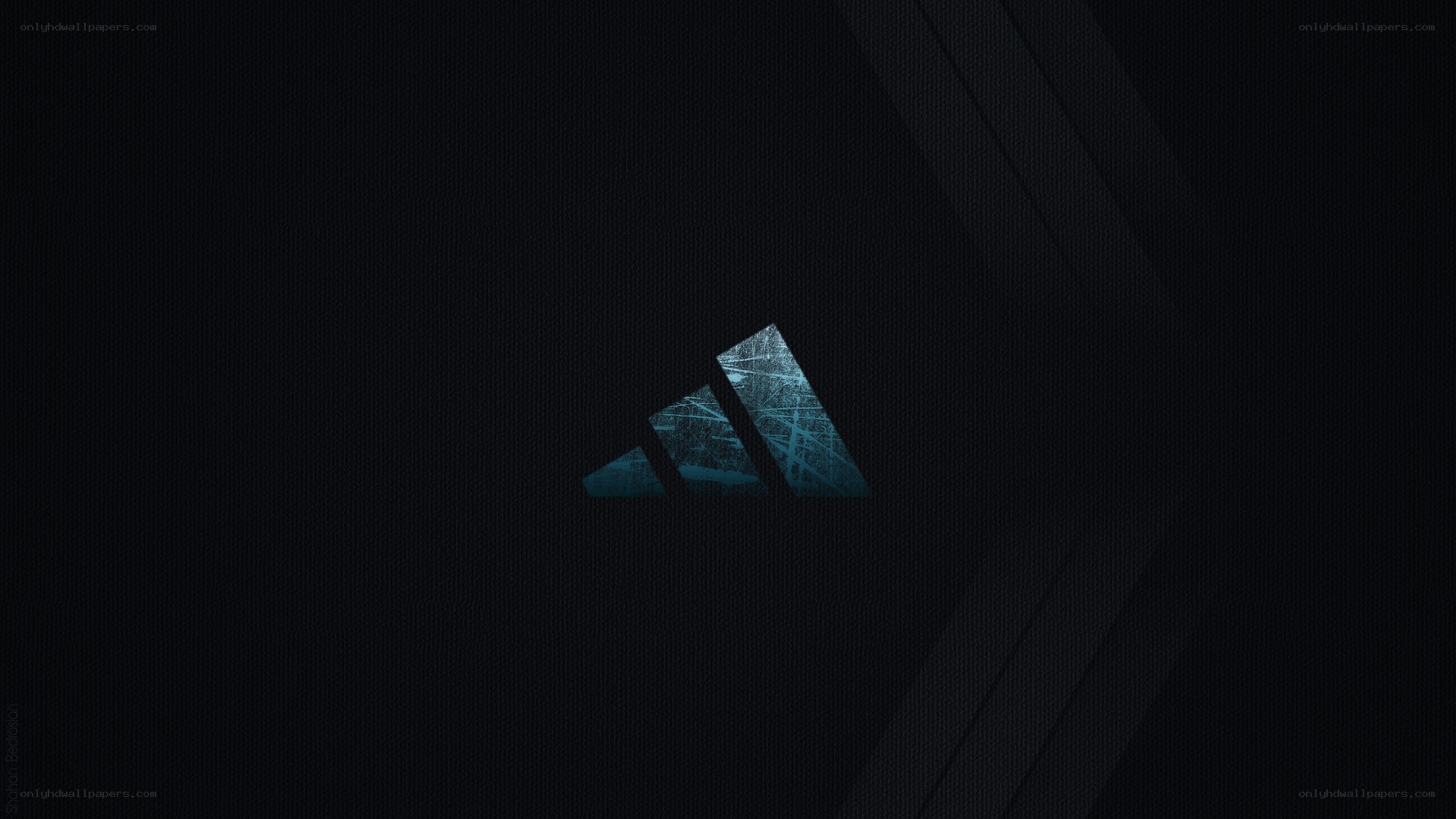 Adidas logo on dark background