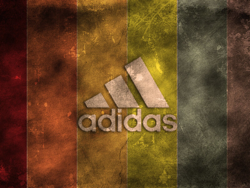 Adidas Logo on Textured Background — Brown