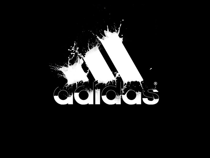 Adidas logo with paint splatter